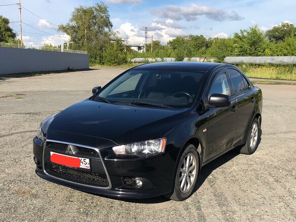 2014 Mitsubishi Lancer X Рестайлинг, чёрный, 980000 рублей