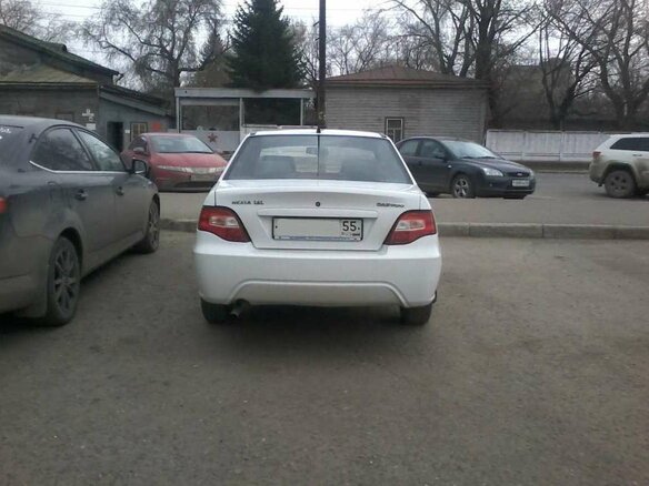 2010 Daewoo Nexia I Рестайлинг, белый - вид 1