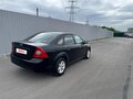 2009 Ford Focus II Рестайлинг, чёрный, 520000 рублей - вид 2