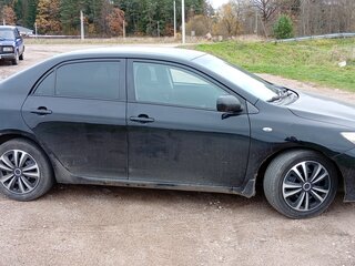 2009 Toyota Corolla X (E140, E150), чёрный, 650000 рублей, вид 3