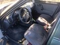 2004 Lada (ВАЗ) 2112, серый, 220000 рублей - вид 9