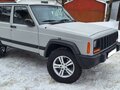 1990 Jeep Cherokee II (XJ), серый, 950000 рублей - вид 3