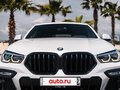 2020 BMW X6 40i III (G06), белый, 7499900 рублей - вид 2