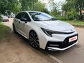 2022 Toyota Levin XII (E210) Рестайлинг, белый, 1950000 рублей - вид 2