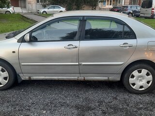2004 Toyota Corolla IX (E120, E130) Рестайлинг, серебристый, 500000 рублей, вид 3