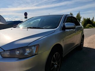 2009 Mitsubishi Lancer X, серебристый, 550000 рублей, вид 2