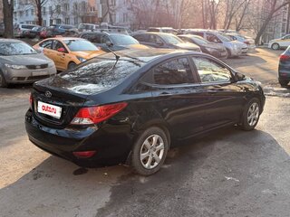 2011 Hyundai Solaris I, чёрный, 650000 рублей, вид 4