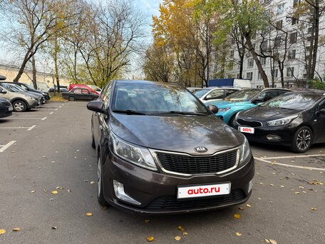 2014 Kia Rio 6-speed III, коричневый, 850000 рублей, вид 2