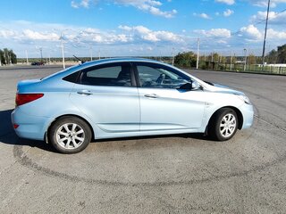 2012 Hyundai Solaris I, серый, 730000 рублей, вид 4