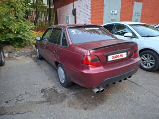 2012 Daewoo Nexia I Рестайлинг, пурпурный, 200000 рублей, вид 3