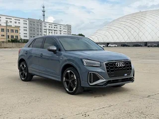2023 Audi Q2 L 35 TFSI I Рестайлинг, серый, 2150000 рублей, вид 3