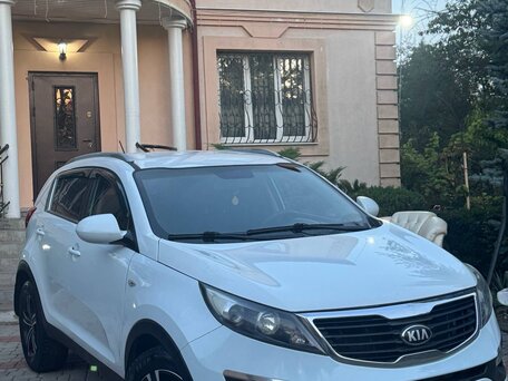 2012 Kia Sportage III, белый, 1180000 рублей, вид 4