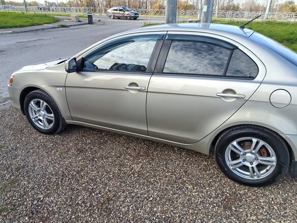 2008 Mitsubishi Lancer X, бежевый, 620000 рублей - вид 3