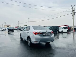 2014 Toyota Corolla XI (E160, E170, E180), серебристый, 1099999 рублей, вид 4
