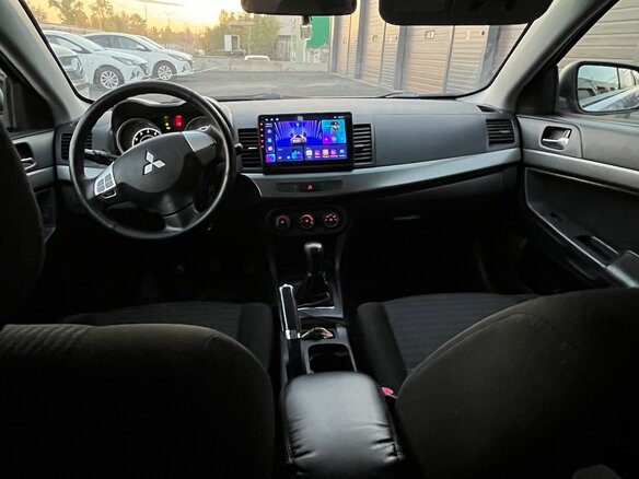 2012 Mitsubishi Lancer X Рестайлинг, серебристый, 720000 рублей - вид 8