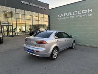 2012 Mitsubishi Lancer X Рестайлинг, серебристый, 799000 рублей, вид 2