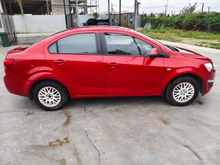 2012 Chevrolet Aveo II, красный, 780000 рублей, вид 2