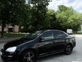 2009 Volkswagen Jetta V, чёрный - вид 4