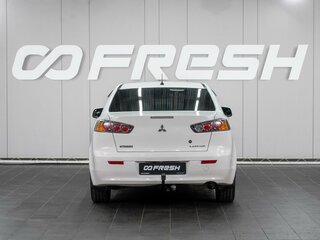 2012 Mitsubishi Lancer X Рестайлинг, белый, 899000 рублей, вид 4