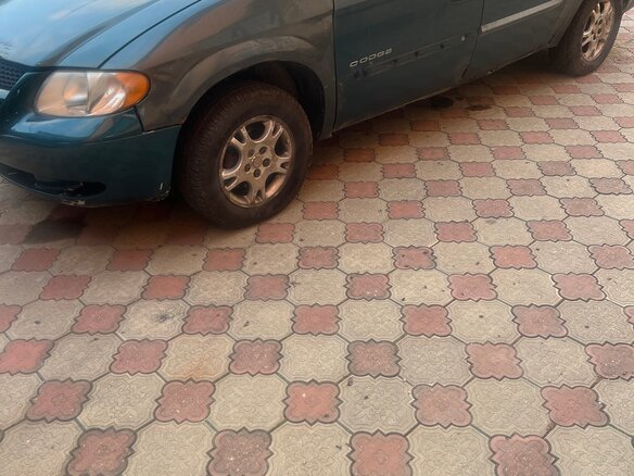 2003 Dodge Caravan IV, серый - вид 1