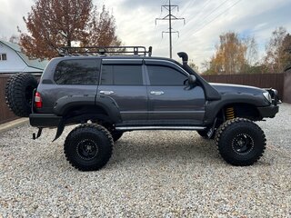 2004 Toyota Land Cruiser 105 100 Series Рестайлинг 1, серый, 5015000 рублей, вид 3