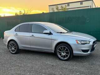 2009 Mitsubishi Lancer X, серебристый, 695000 рублей, вид 2