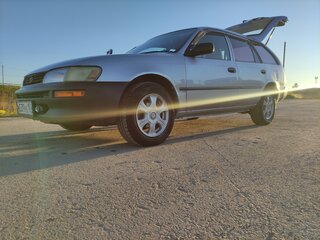 2001 Toyota Corolla VII (E100), серебристый, 270000 рублей, вид 1