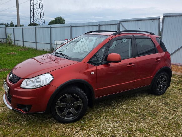 2010 Suzuki SX4 I (Classic) Рестайлинг, оранжевый, 645000 рублей - вид 12