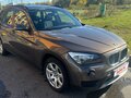 2012 BMW X1 18i I (E84) Рестайлинг, коричневый, 1650000 рублей - вид 1