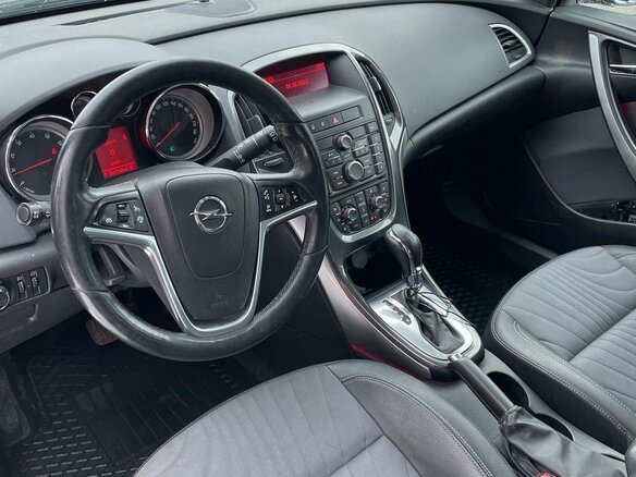 2013 Opel Astra J Рестайлинг, коричневый, 828000 рублей - вид 5
