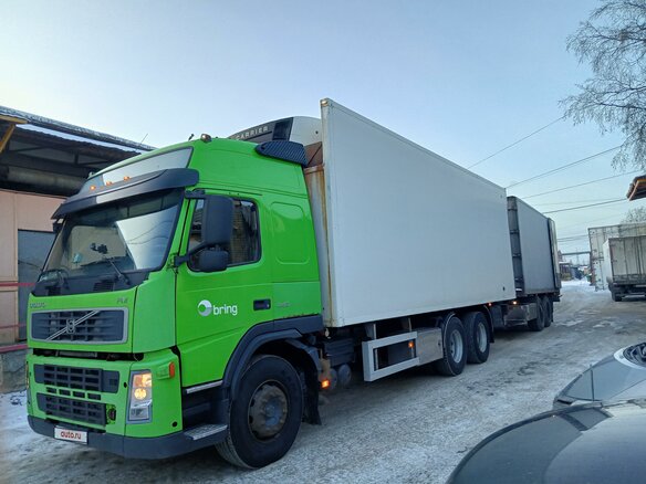2009 Volvo FM, зелёный, 5100000 рублей - вид 1