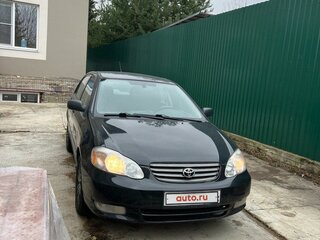 2002 Toyota Corolla IX (E120, E130), чёрный, 700000 рублей, вид 2
