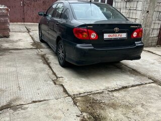2002 Toyota Corolla IX (E120, E130), чёрный, 700000 рублей, вид 3