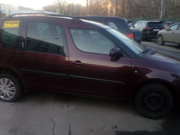 2009 Skoda Roomster I, пурпурный - вид 2