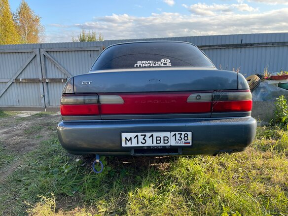 1992 Toyota Corolla VII (E100), синий - вид 7