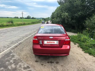 2011 Chevrolet Aveo I Рестайлинг, красный, 350000 рублей, вид 3