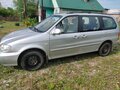 2004 Kia Carnival I Рестайлинг, серебристый, 330000 рублей - вид 3