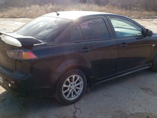 2010 Mitsubishi Lancer X, чёрный, 710000 рублей, вид 1