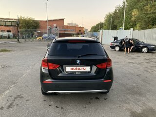 2011 BMW X1 18i I (E84), чёрный, 1100000 рублей, вид 3