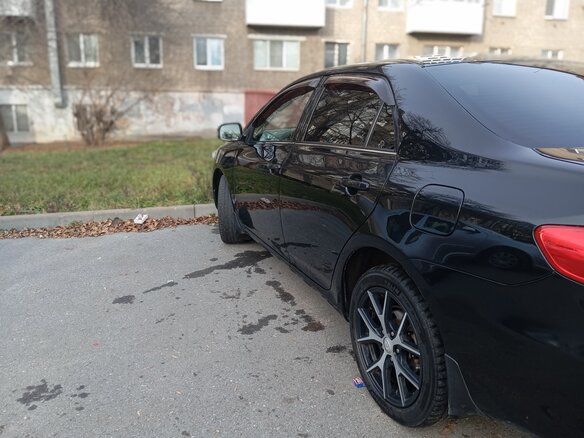 2010 Toyota Corolla X (E140, E150) Рестайлинг, чёрный, 1100000 рублей - вид 12