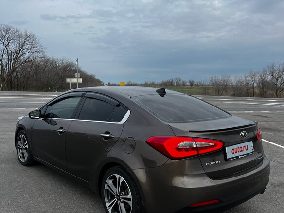 2016 Kia Cerato III Рестайлинг (Classic), коричневый, 1450000 рублей - вид 9