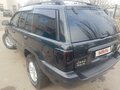 2003 Jeep Grand Cherokee II (WJ), чёрный - вид 1