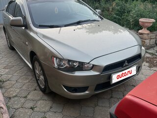 2009 Mitsubishi Lancer X, бежевый, 730000 рублей, вид 1