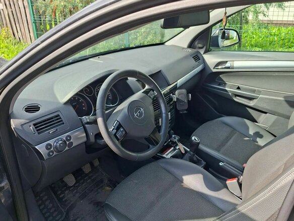 2010 Opel Astra H Рестайлинг, чёрный - вид 4