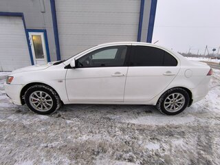 2013 Mitsubishi Lancer X Рестайлинг, белый, 730000 рублей, вид 4