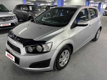 2012 Chevrolet Aveo II, серебристый, 599000 рублей, вид 1