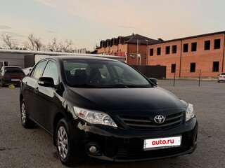 2010 Toyota Corolla X (E140, E150) Рестайлинг, чёрный, 810000 рублей, вид 3