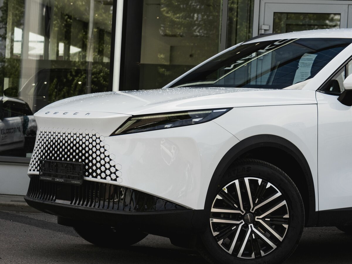 Открыть фотографии: Omoda C7