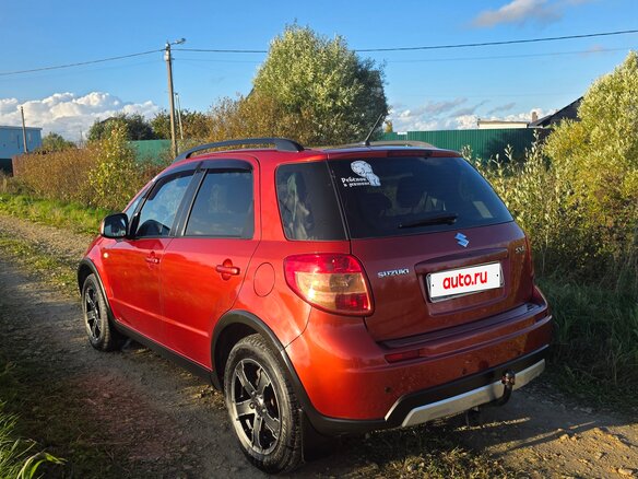 2010 Suzuki SX4 I (Classic) Рестайлинг, оранжевый, 645000 рублей - вид 9