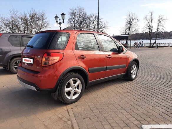 2011 Suzuki SX4 I (Classic) Рестайлинг, оранжевый - вид 4